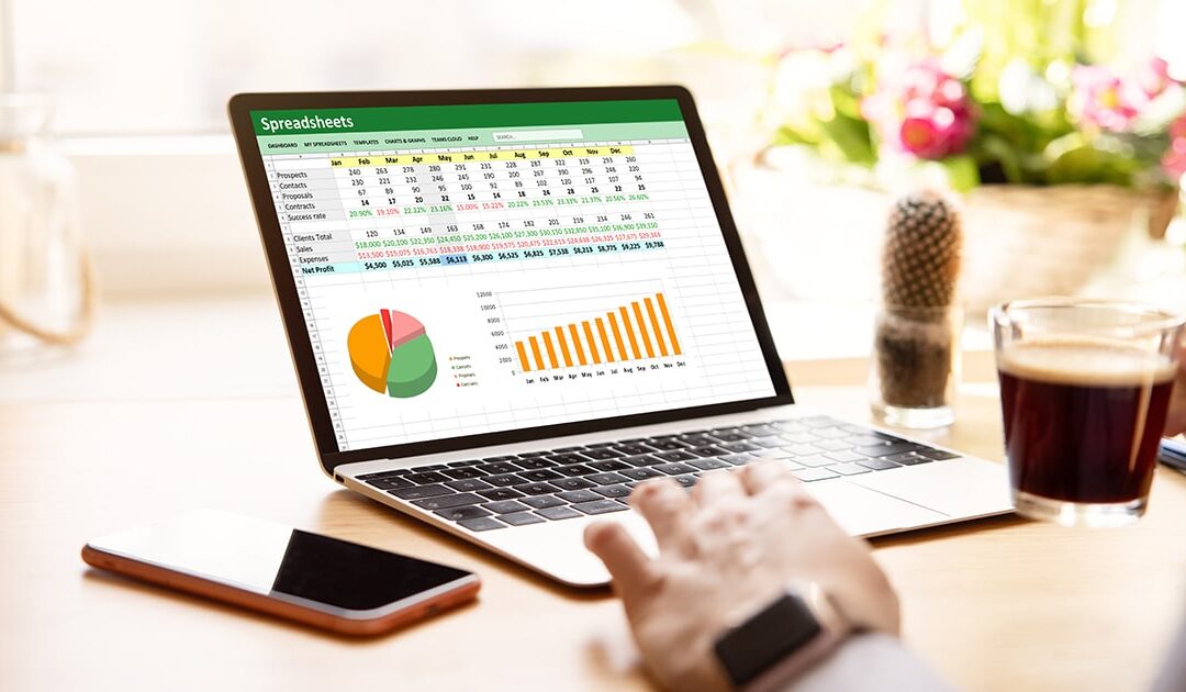 Person working on a laptop - excel hacks for productivity