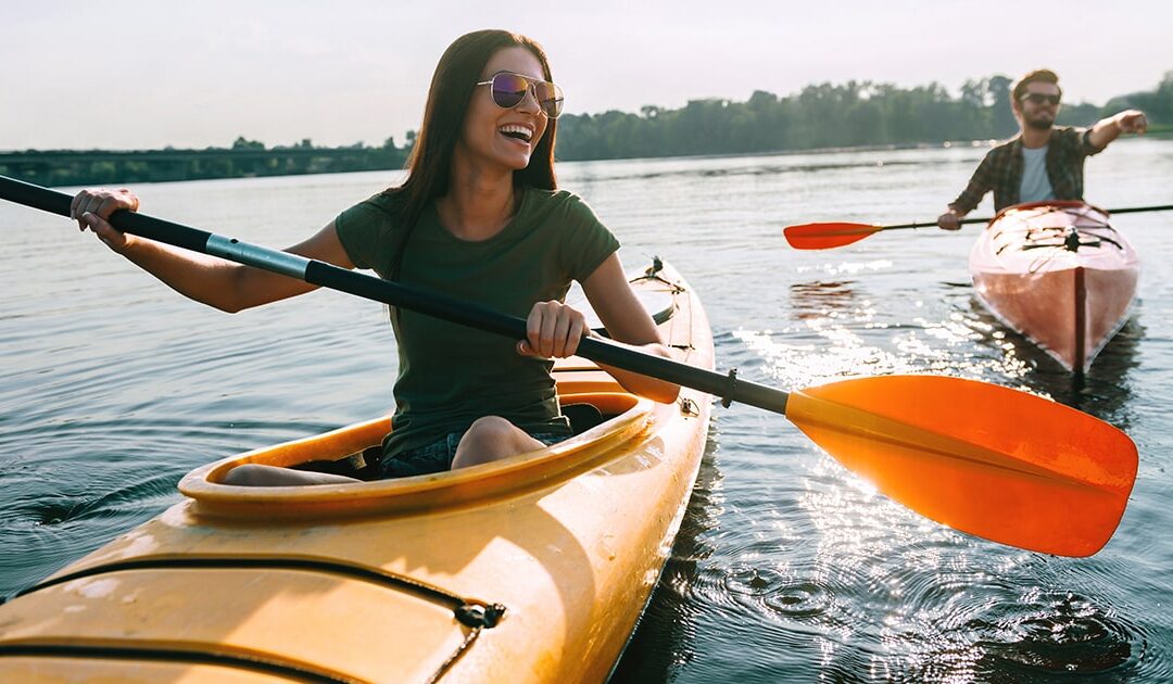 Female in kayak on water - creative ways to stay active and energized