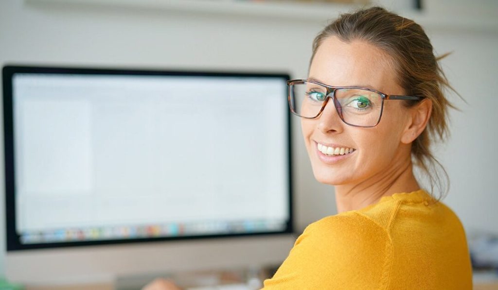 Female working at a computer - ACCO wrist pillow