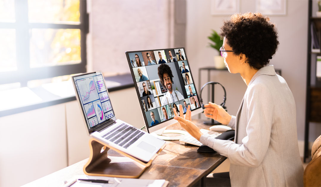 Person giving a presentation on computer - Microsoft PowerPoint