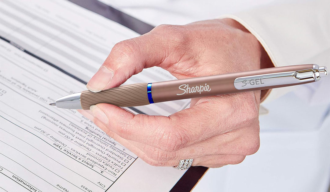 Person holding Sharpie S-Gel Pen - Evergreen Office Solutions